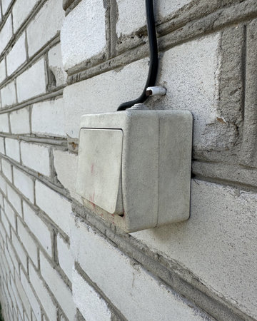 old white street light switch.