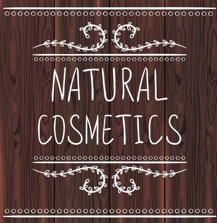 NATURAL COSMETICS handwritten letters on brown wood backgroundのイラスト素材