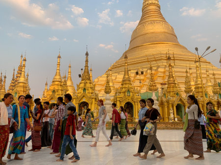 Yangon, Myanmar - March 3, 2020 - Unidentified crowd walk around Shwedagon Pagoda in Myanmar, religious temple.のeditorial素材