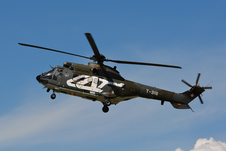 This is the Eurocopter AS 332 M1 Super Puma T316 from the Swiss Air Force. The Super Puma is suitable for many military and civilian purposes. Here we can see it at the air14 show in Payerne Switzerland on the 30th of August 2014.のeditorial素材