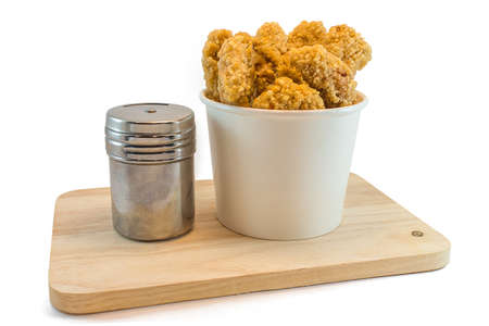 Chicken nuggets in paper boxes on white backgroundの写真素材