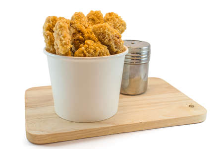 Chicken nuggets in paper boxes on white backgroundの写真素材