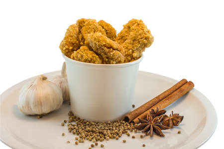 Chicken nuggets in paper boxes on white backgroundの写真素材