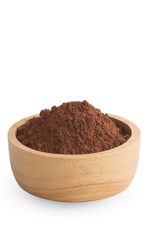 Cocoa powder in wooden big bowl isolated on white background.の写真素材