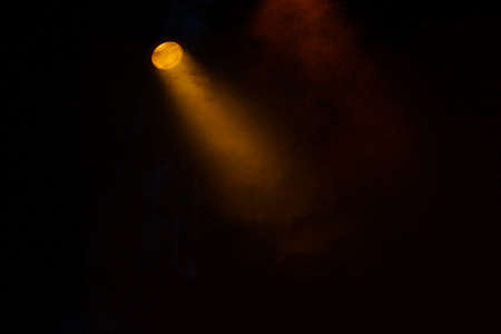 Colored lights illuminate the theatrical stageの写真素材