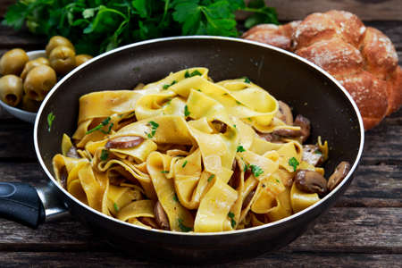 Pappardelle Pasta with mushrooms and other herbs.の写真素材
