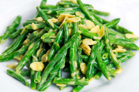 Green beans roasts garlic and flaked almond.