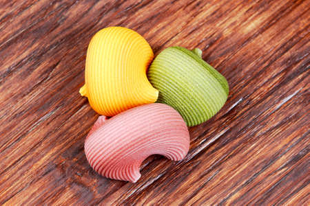 Dry Italian Lumaconi pasta in 3 colours.の写真素材