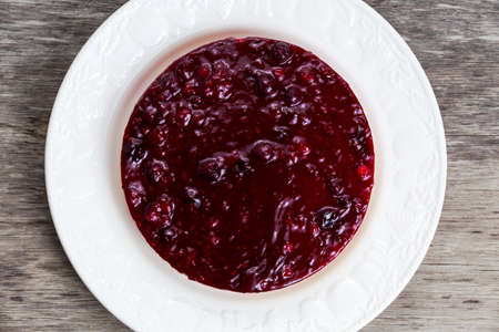 Black  berry fruit cheesecake on plate. view from top.の写真素材