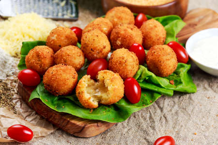 Fried mozzarella cheese stick balls and ingredients.