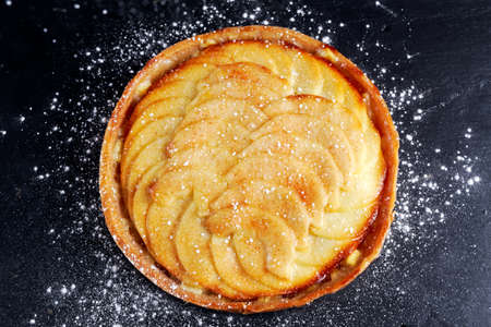 Golden Bramley apple tart with cinnamon glaze.の写真素材