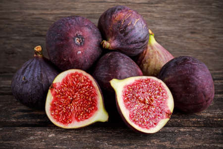 Fresh Figs slice on wooden table background.の写真素材