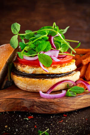 Halloumi cheese, mushroom Burger with sweet potatoes fries. concept of health food.の写真素材
