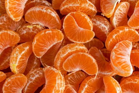 Fresh close up mandarin Tangerines oranges background.の写真素材