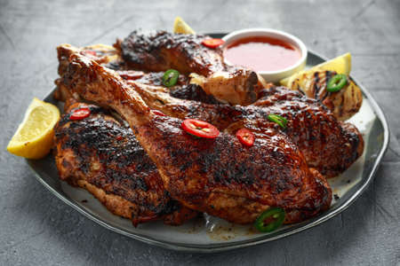 Grilled chicken legs with lemon and sweet chilli sauce