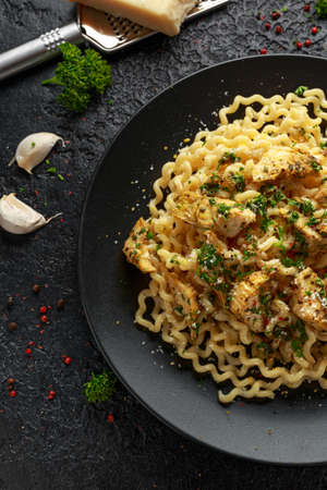 Artichoke hearts and lemon pasta with parmesan cheese and parsleyの写真素材