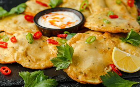 Traditional Indian snack food, chicken and vegetable staffing kachori