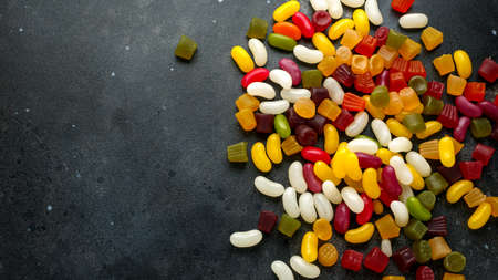 A mix of colorful candy on background, textureの写真素材