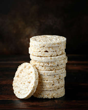 Stack of Rice crackers on wooden table. healthy food
