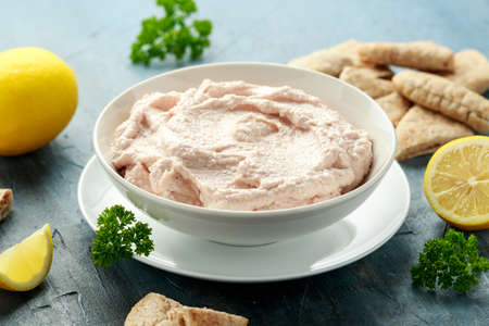 Taramasalata dip made with fish roe in white bowl