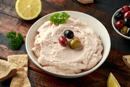 Taramasalata dip with pita bread and olivesの写真素材