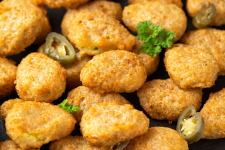Crispy Jalapeno Popper with creamy cheese battered party food bitesの写真素材