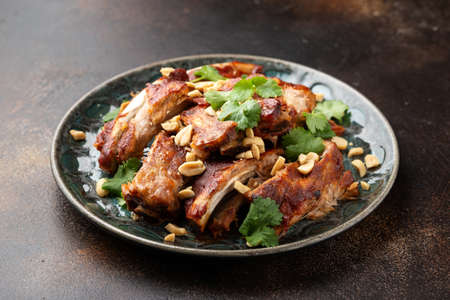 Chinese Pork ribs with peanuts and corianderの写真素材