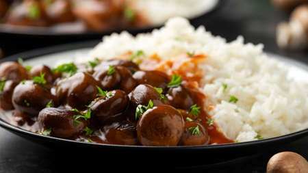 Mushrooms in Balsamic Soy rich sauce with rice. healthy vegan food.の写真素材