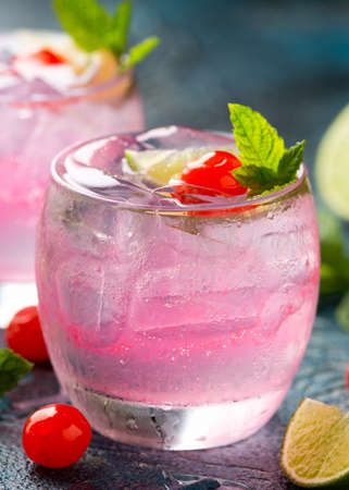 Cherry Limeade or Lemonade in drinking glass. Refreshing summer drink.