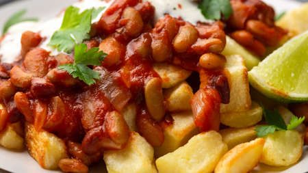 Spicy Bean Chilli with Baked Potato, sour cream and lime. Healthy Foodの写真素材