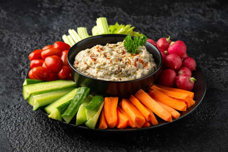 Baba ganoush dip made with grilled aubergine or eggplant, lemon juice, olive oil and tahini....