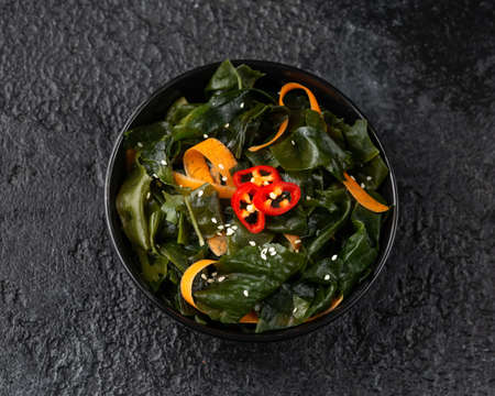 Wakame Seaweed salad with carrots, sesame seeds and sauce. Healthy food.の写真素材