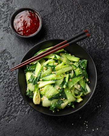 Chinese fried Pak Choi with garlic, sesame seeds. Healthy foodの写真素材