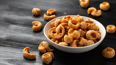 Crispy Pork crackling, scratchings. deep fries in white bowl