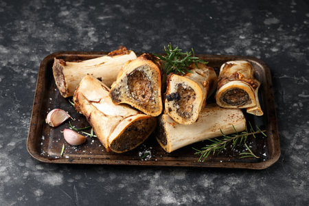 Homemade Roasted Beef Bone Marrow with rosemary and toastの写真素材