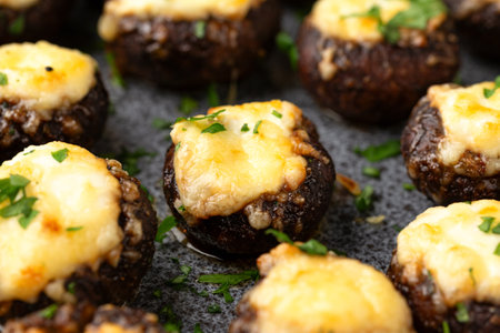 Baked stuffed mushroom with cheese, herbs and cream cheese.の写真素材