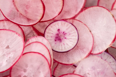 Freshly sliced radish, purple colorful radish. Close Up, macro photoの写真素材