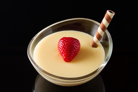 Vanilla Pudding  with Strawberry and Waffleの写真素材