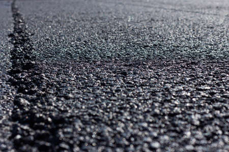 Asphalt road close-up, road works, asphalt textureの写真素材