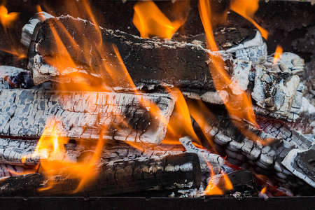 burning wood in a brazier, mangal or bbq