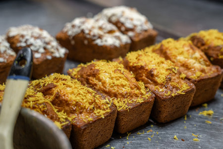 Sweet bakery production, baking, sweet bread with sprinklesの写真素材