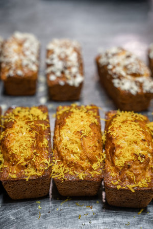 Sweet bakery production, baking, bread with sprinklesの写真素材