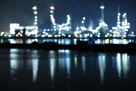 Oil Refinery with the boat parking near riverside in the Chao Phraya River, in the Bangchak area of...