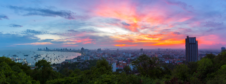The building and skyscrapers in twilight time, Pattaya,Thailand. Pattaya city is famous about sea sport and night life entertainment. (Panorama view)のeditorial素材