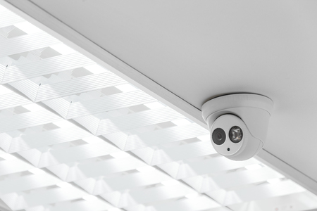 Indoor CCTV monitoring, security cameras inside a meeting room.