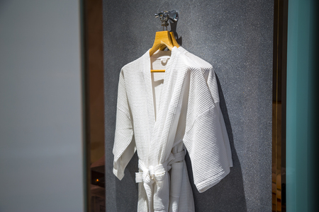 White Bathrobes on a hanger.の写真素材