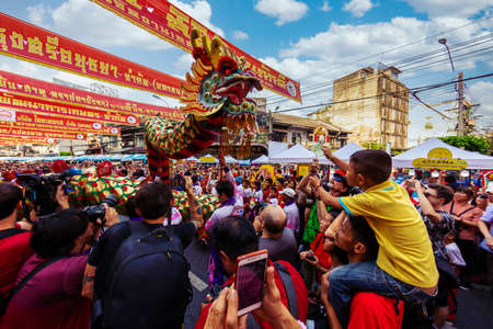 Bangkok, Thailand - February 14, 2021 : Dragon and lion dance show in chinese new year festival.のeditorial素材