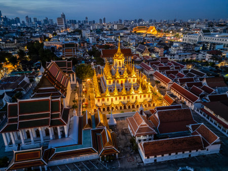 Wat Saket Ratcha Wora Maha Wihan and Lohaprasat in Wat Ratchanatdaram Worawihan which is landmark in Bangkok, Thailand with bangkok cityscape background.の写真素材