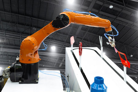 Robotic arm painting spray to the automotive part. High-technology manufacturing concept. (with clipping path)の写真素材