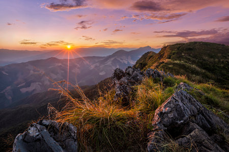 Sunset at Doi Pha Tang, Chiang Rai, Thailand.の写真素材